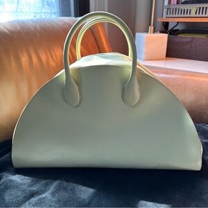 Calvin Klein runway designer collection leather yellow bowling bag studio luxury